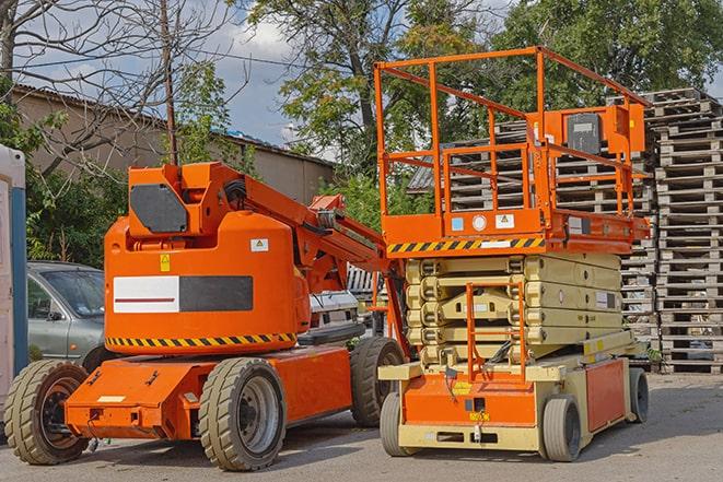 industrial forklift lifting heavy loads in a warehouse in Crestwood