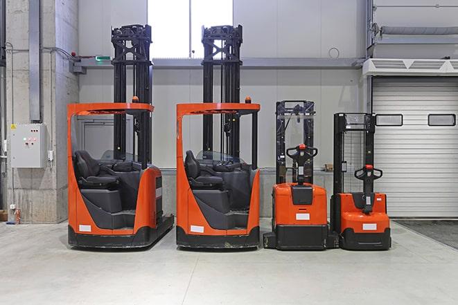 forklifts parked in a loading dock